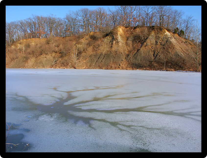 View of ice covered Emerald Pond at Kickapoo State Park in Illinois.