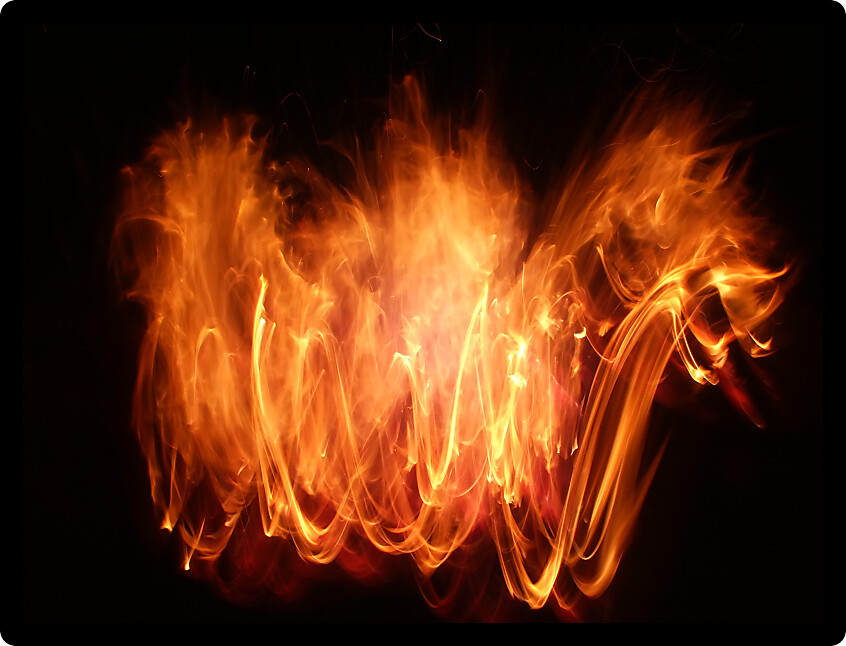 Bright explosion of flame lights up the night.