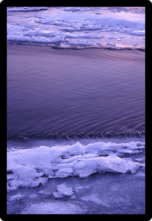 Icy waters of the Kishwaukee River in northern Illinois.