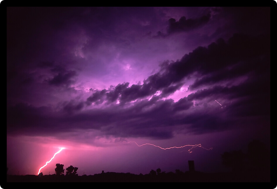 Lightning strikes the ground during a summer thunderstorm near Rockford Illinois.
