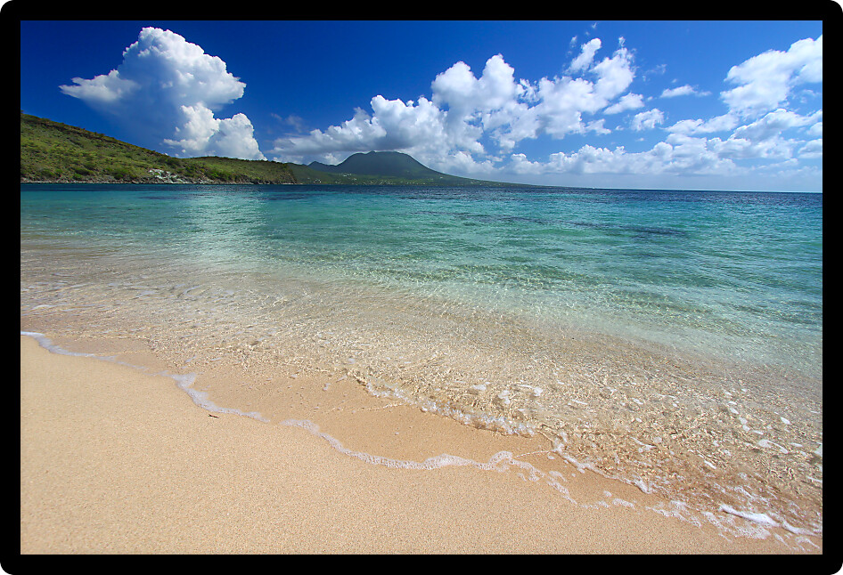 Secluded tropical beach on the Caribbean island of Saint Kitts.