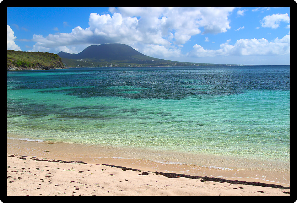 Tranquil Caribbean beach and crystal clear water on Saint Kitts.