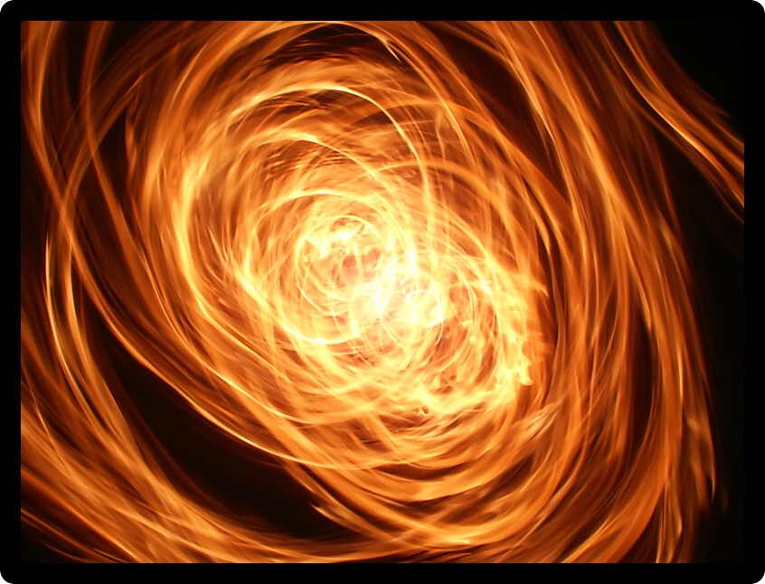 Vivid whirlwind of flame lights up the night.