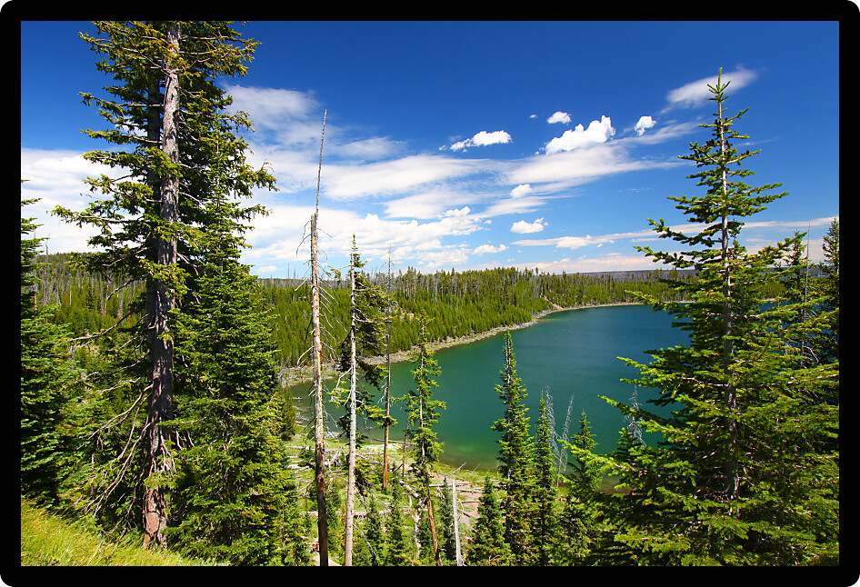 Beautiful blue waters of Duck Lake in Yellowstone National Park of Wyoming.