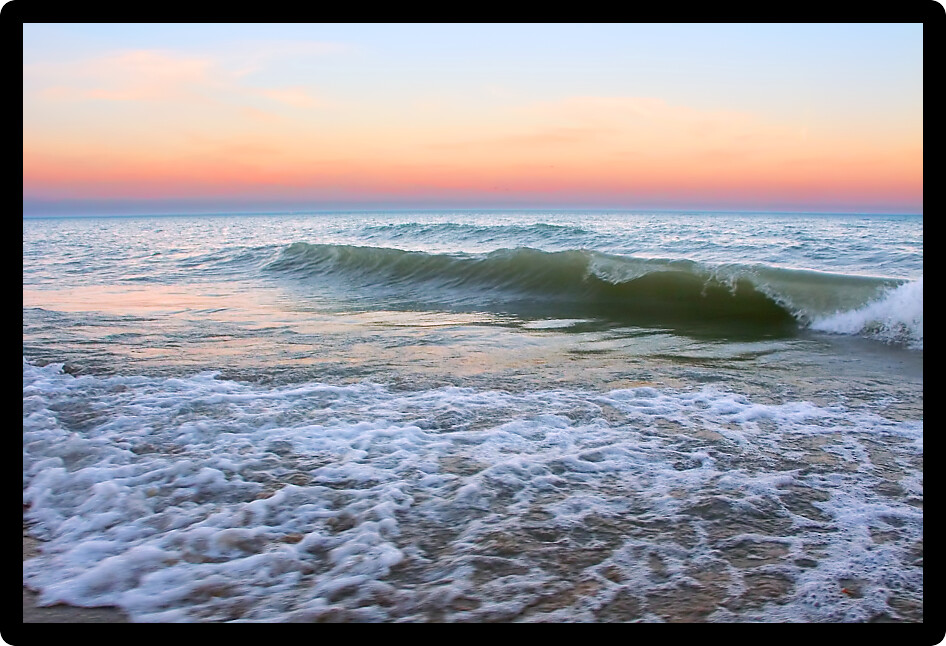 Waves under a beautiful Lake Michigan sunset at Illinois Beach State Park.