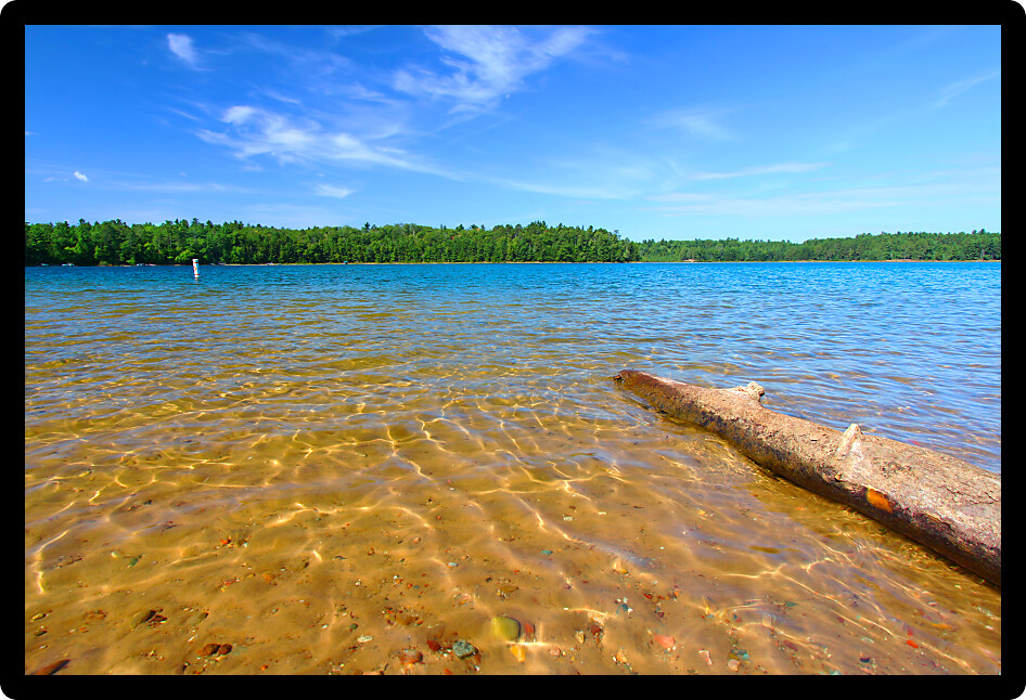 Beautiful swimming beach of Buffalo Lake in the Northern Highland American Legion State Forest of Wisconsin.