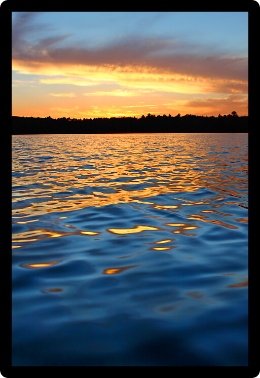 Sunlight reflects off ripples of Sweeney Lake in Wisconsin.