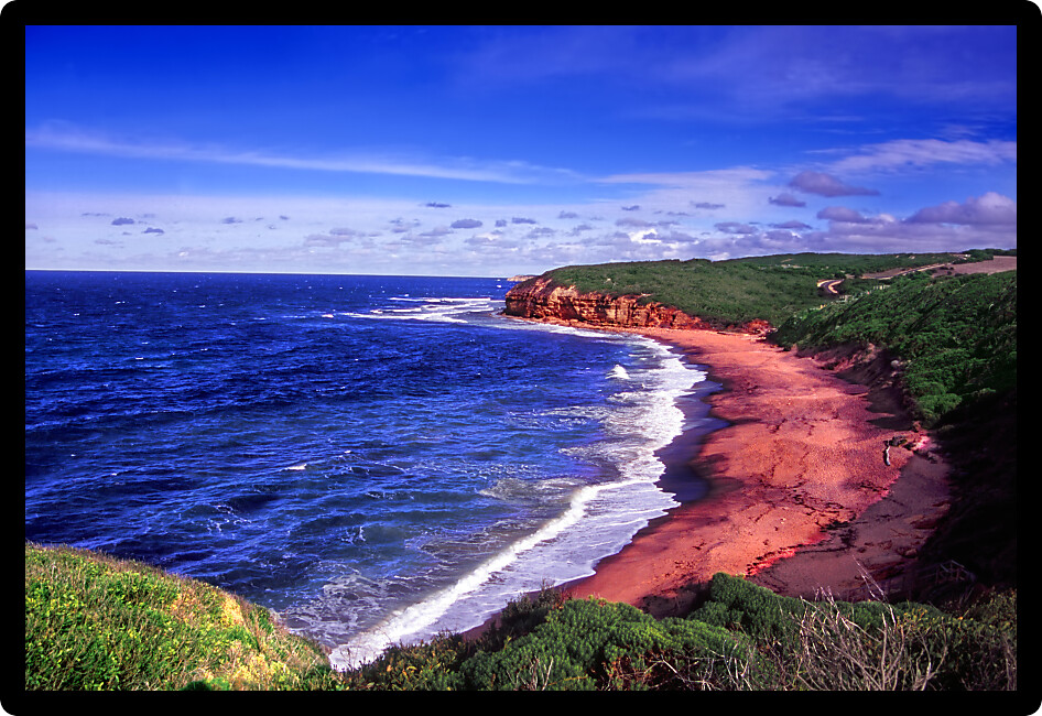 Waves wash ashore at Bells Beach along the Great Ocean Road in Victoria Australia.