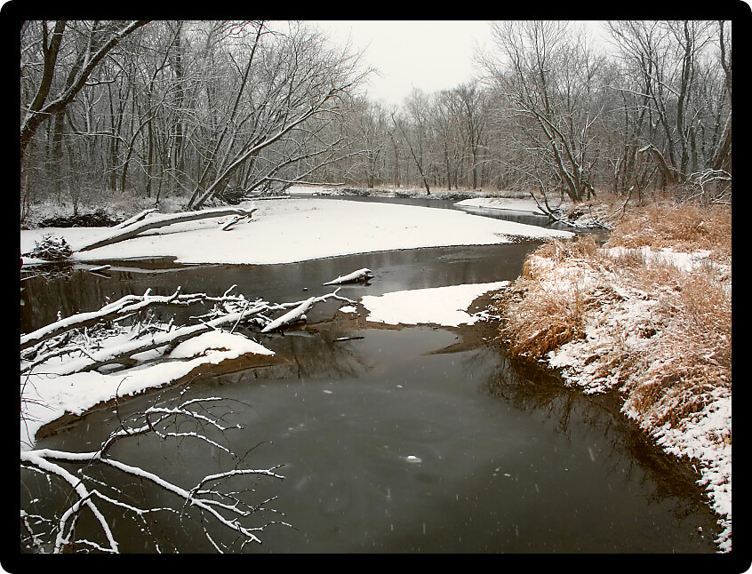 Snowy day along the Kishwaukee River in northern Illinois USA.