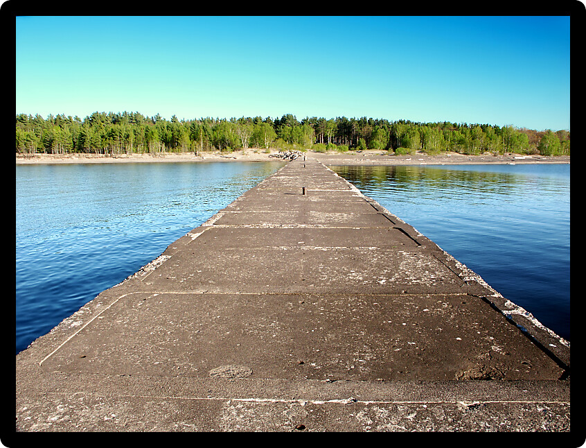 Concrete causeway stretching into Lake Superior at McLain State Park in Michigans Keweenaw Peninsula.