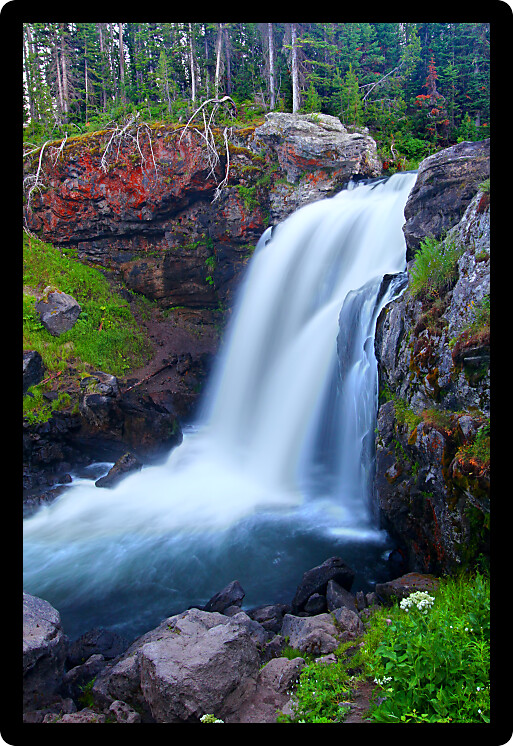 Beautiful Moose Falls in evening light at Yellowstone National Park Wyoming.