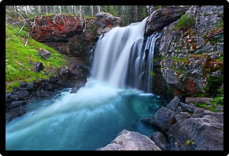 Beautiful Moose Falls in evening light at Yellowstone National Park Wyoming.