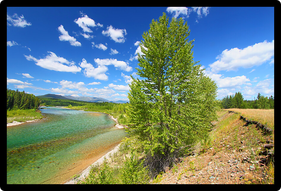 North Fork Flathead River flows along the western border of Glacier National Park Montana.