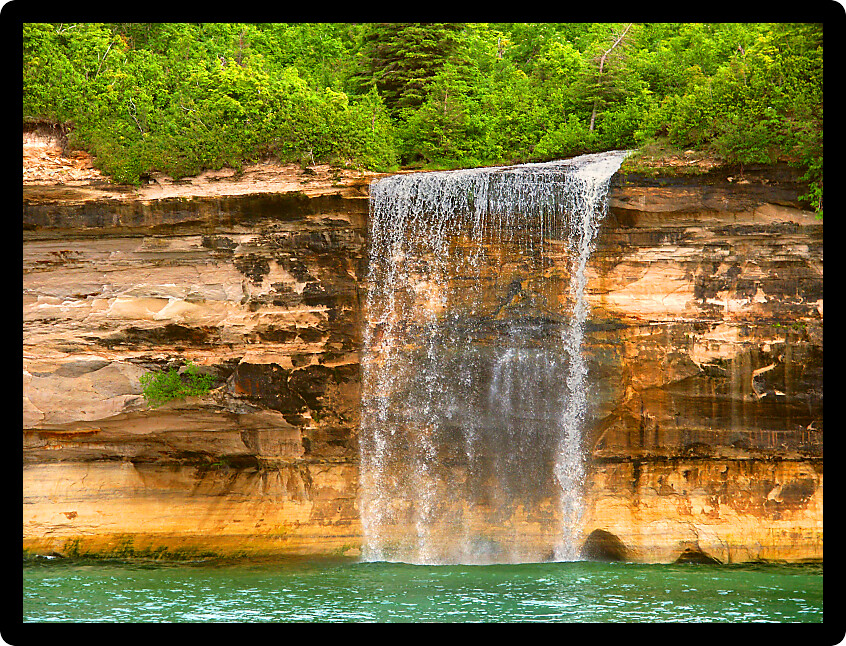 Spray Falls plunges into Lake Superior at Pictured Rocks National Lakeshore in Michigan.