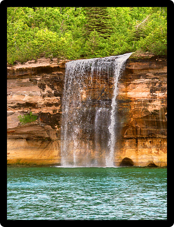 Spray Falls plunges into Lake Superior at Pictured Rocks National Lakeshore in Michigan.