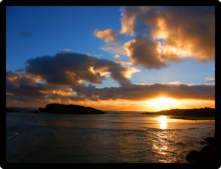 Sunset where the Merri River empties into the sea at Warrnambool in Victoria Australia.