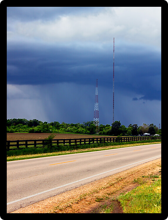 Heavy spring rains sweep over agricultural fields outside the village of Cherry Valley Illinois.