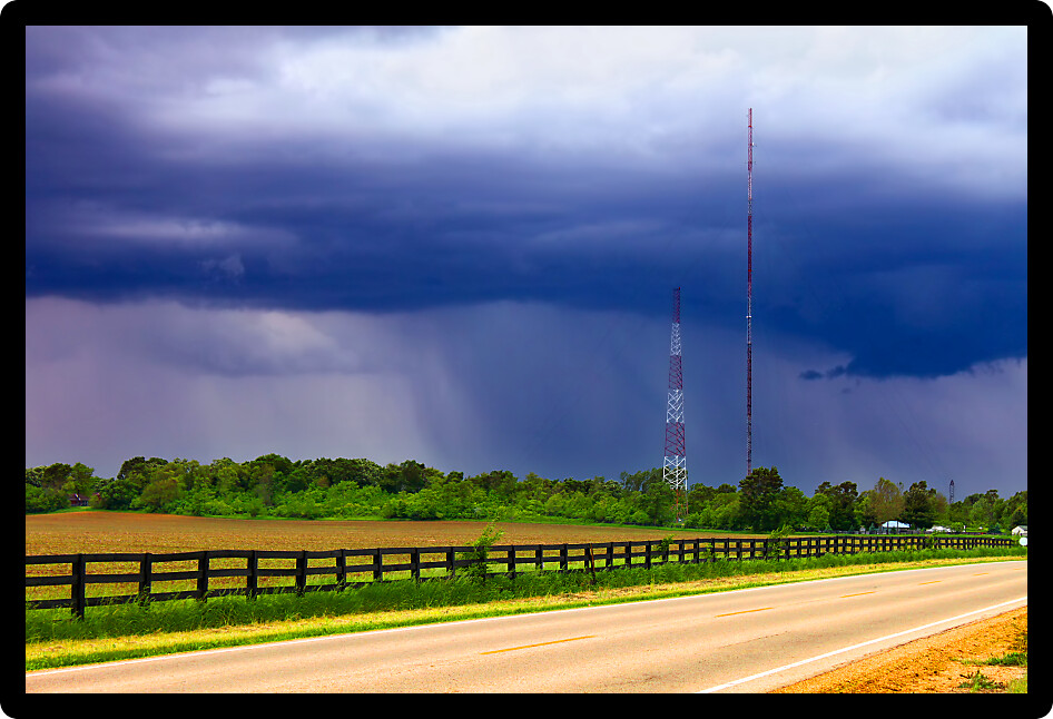 Heavy spring rains sweep over agricultural fields outside the village of Cherry Valley Illinois.