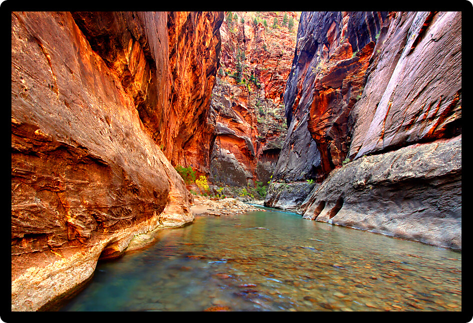 Smooth cascades of the Virgin River flow through The Narrows of Zion Canyon in Utah.