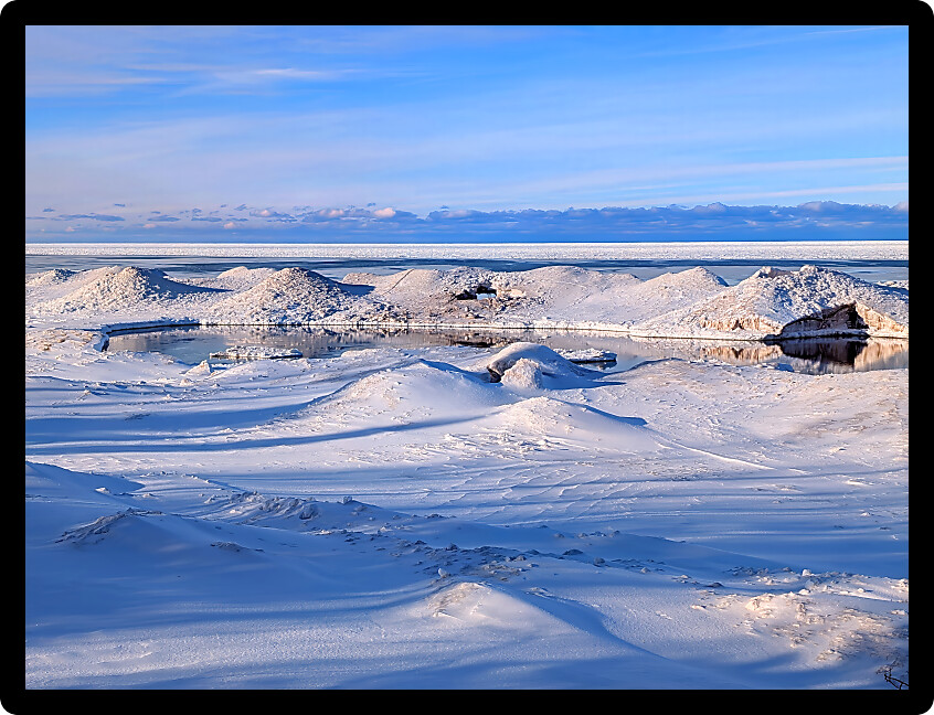Snow and ice piled along the Lake Superior shoreline in the Upper Peninsula of Michigan