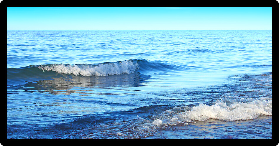 Lake Superior waves crash along the shoreline near Ontonagon Michigan