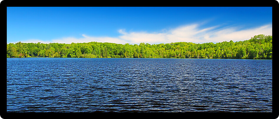 Panoramic view of Little Horsehead Lake on a summer day in northwoods Wisconsin.
