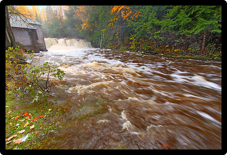 Powerhouse Falls and rapids near L