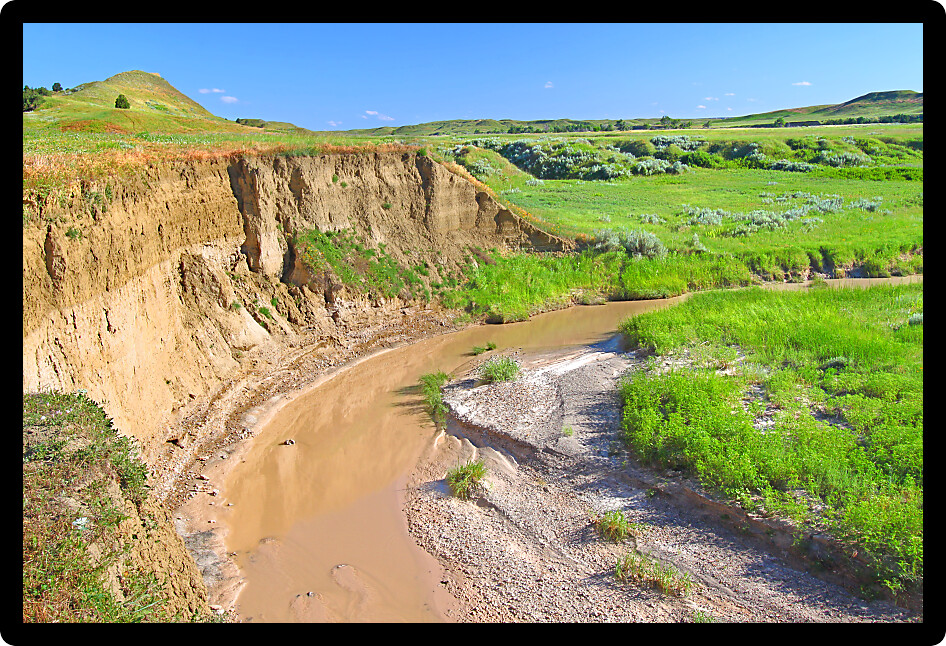 Summer scenery along Sage Creek in Badlands National Park of South Dakota.