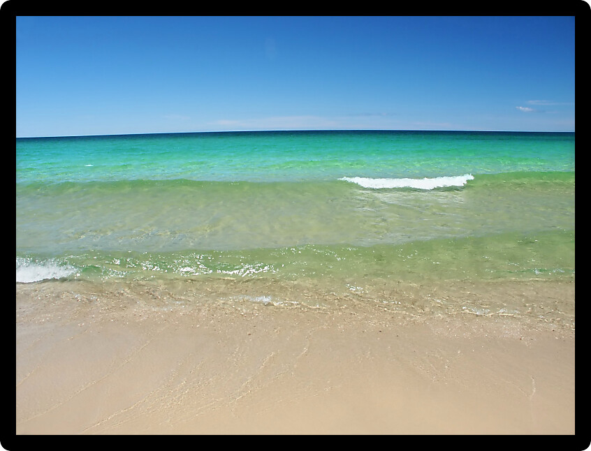 Waves wash ashore at Chapel Beach of the Pictured Rocks National Lakeshore in Michigan.