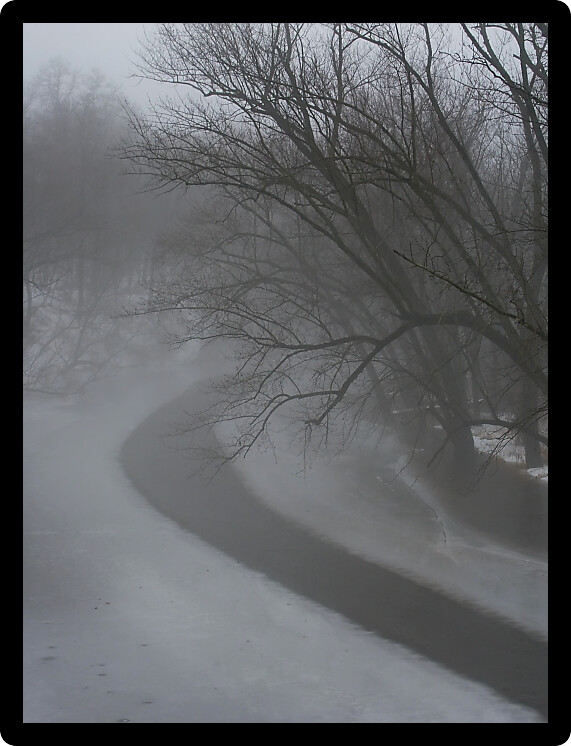 Dense fog over the icy Kishwaukee River in Illinois