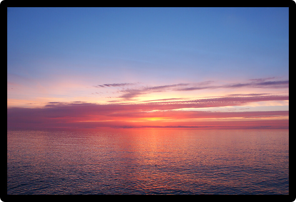 Beautiful pink colors reflect off Lake Superior in northern Michigan.