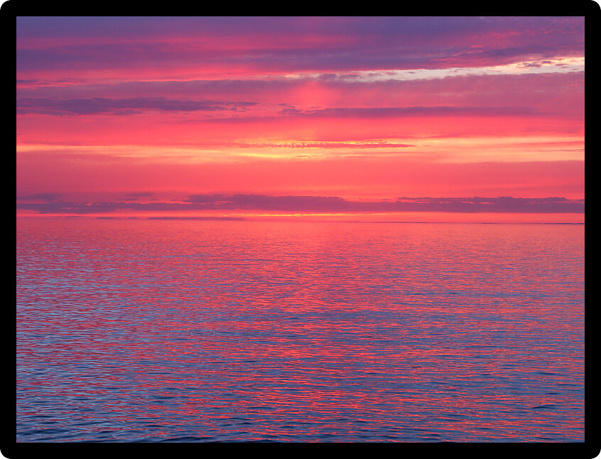 Beautiful pink colors reflect off Lake Superior in northern Michigan.