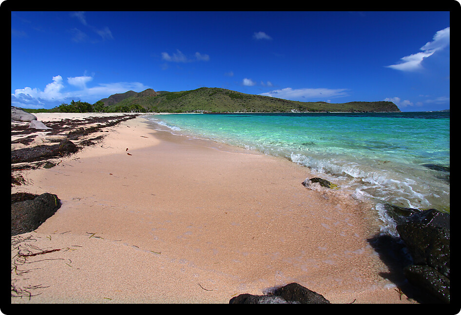 Secluded tropical beach on the Caribbean island of Saint Kitts.