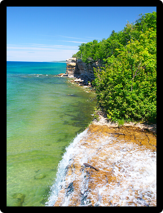 View of Lake Superior from the top of Spray Falls at Pictured Rocks National Lakeshore in Michigan.