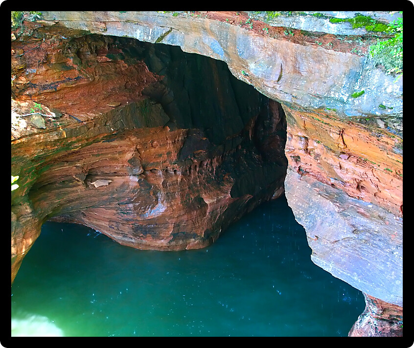 Large cave opens into the shores of Wisconsin at Apostle Island National Lakeshore.