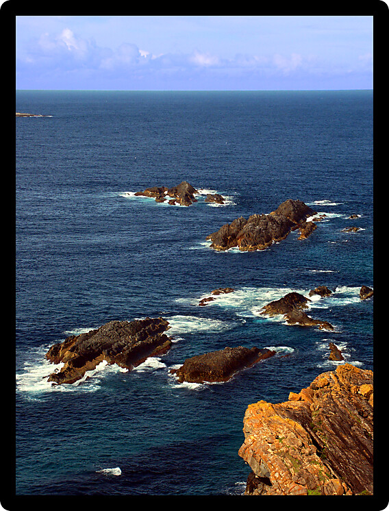 View of the Pacific Ocean from the rocky coast of Booti Booti National Park in Australia.