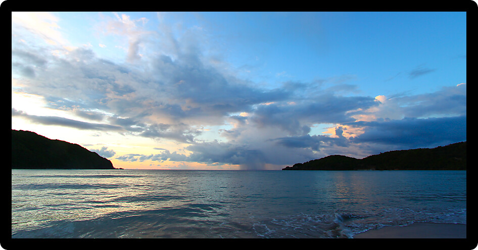 Calm waves wash ashore at Brewers Bay on Tortola British Virgin Islands.
