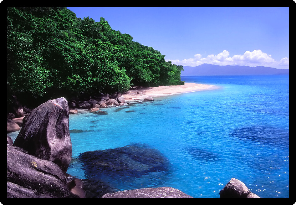 Spectacular clear waters of Nudey Beach on Fitzroy Island in Queensland Australia.