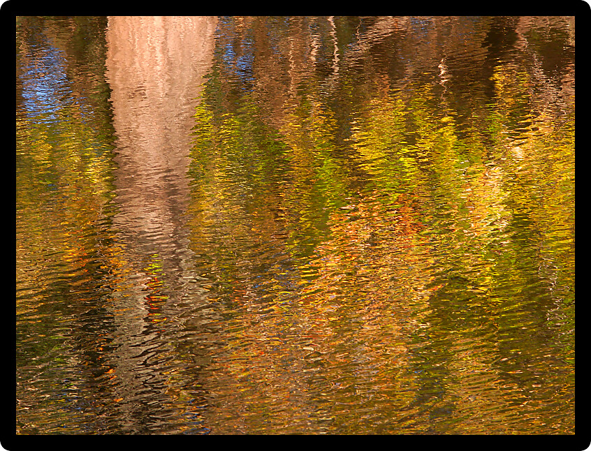 Beautiful fall colors reflect off the Kishwaukee River in Boone County Illinois.