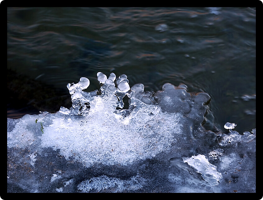 Beautiful ice patterns formed along a creek.