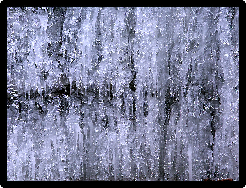 Beautiful ice patterns on a frozen waterfall in Illinois.