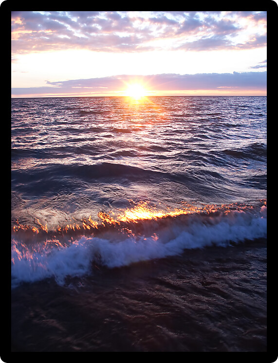 Sun sets over beautiful Lake Superior in northern Michigan.
