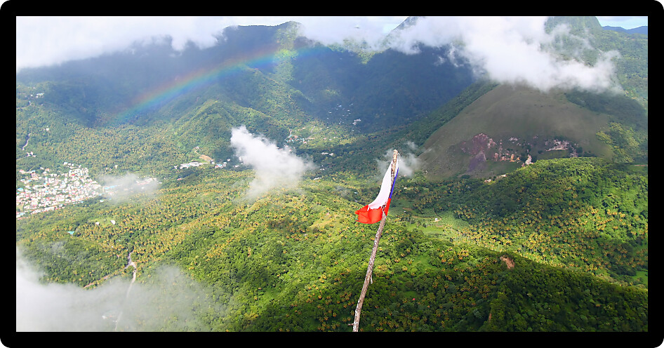 View of Soufriere from the cloud covered summit of the Petit Piton in Saint Lucia.