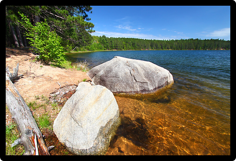 Huge boulder along the shoreline of Buffalo Lake in the Northern Highland-American Legion State Forest of Wisconsin.