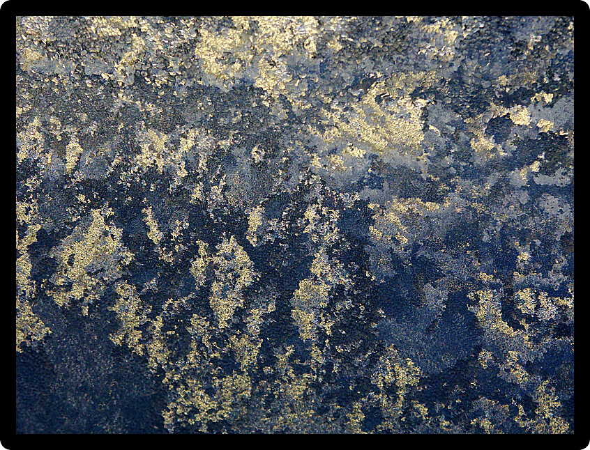 Beautiful ice patterns formed along a creek.