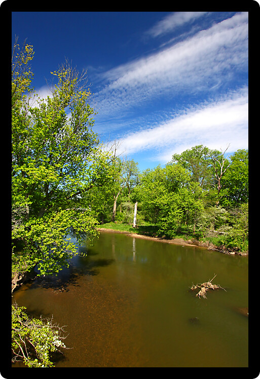 Beautiful blue skies on a spring day along the Kishwaukee River of Illinois.