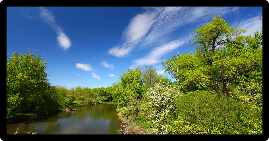 Beautiful blue skies on a spring day along the Kishwaukee River of Illinois.