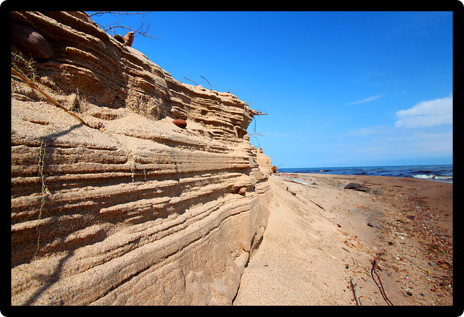 Patterns formed in the sand where a stream runs into Lake Superior.