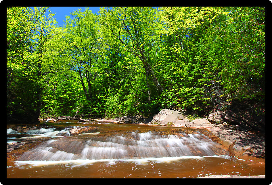 Sunny day at Nonesuch Falls in the Porcupine Mountains Wilderness State Park of Michigan.