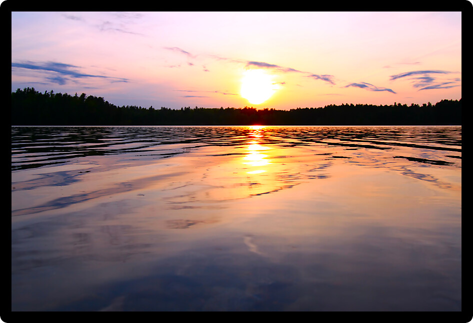 Beautiful sunset seen over Buffalo Lake of northwoods Wisconsin.